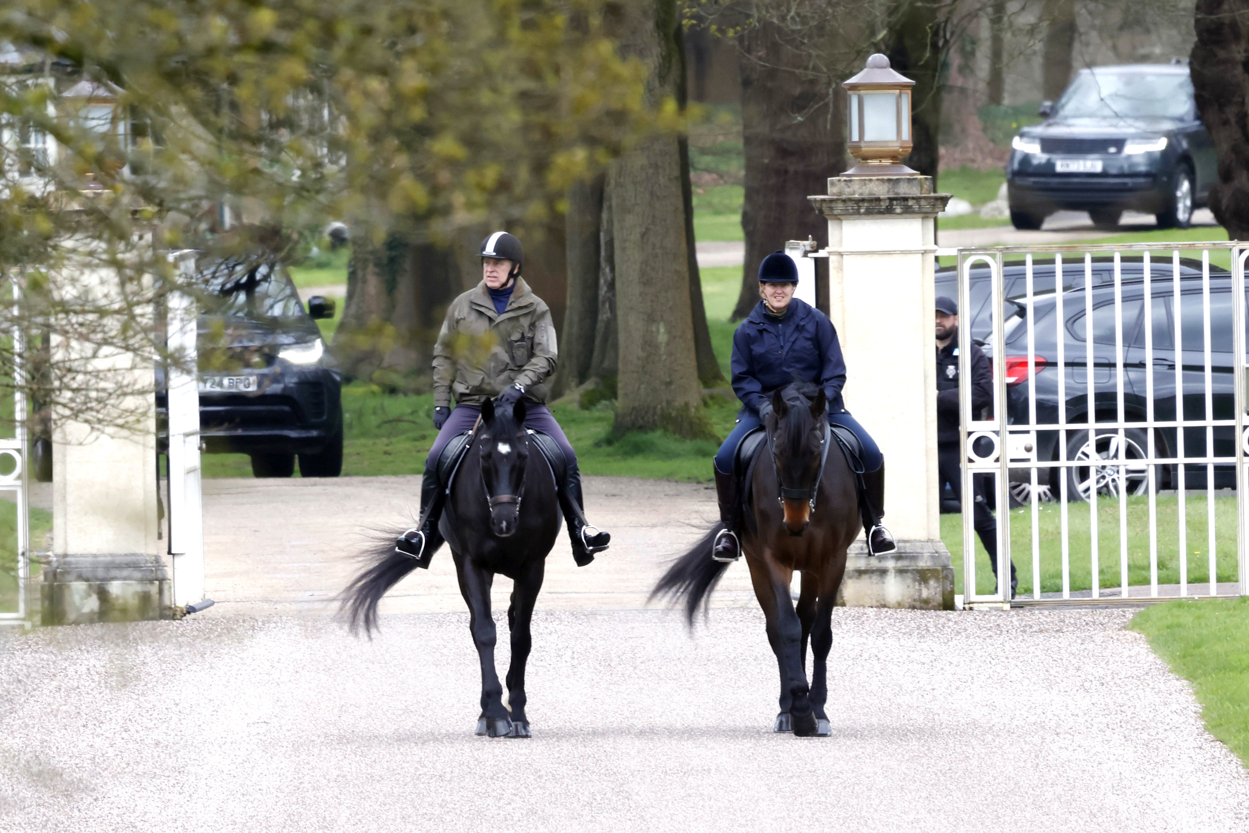 Ex-prince Andrew riding a horse alongside a woman