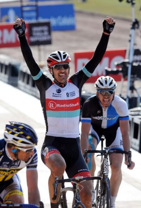 Fabian Cancellara (RadioShack-Leopard) wins the sprint ahead of Sep Vanmarcke (Blanco). The pair had to sprint around other riders who entered the velodrome behind them.