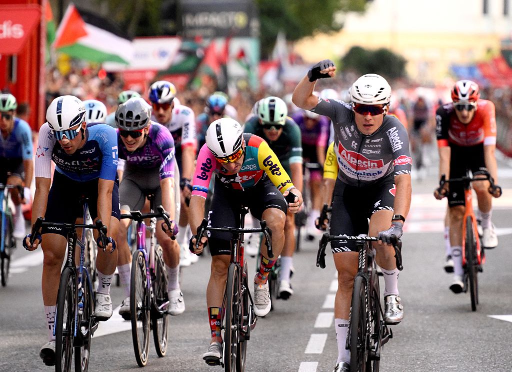 Team Alpecin&#039;s Belgian rider Jasper Philipsen (R) celebrates crossing first the finish line during the 8th stage of the Vuelta a Espana, a 158 km race between Monzon Templario and Zaragoza, on August 30, 2025. (Photo by Josep LAGO / AFP) (Photo by JOSEP LAGO/AFP via Getty Images)