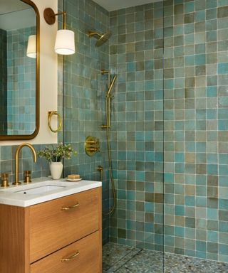 Blue tiles bathroom designed around a one wall layout