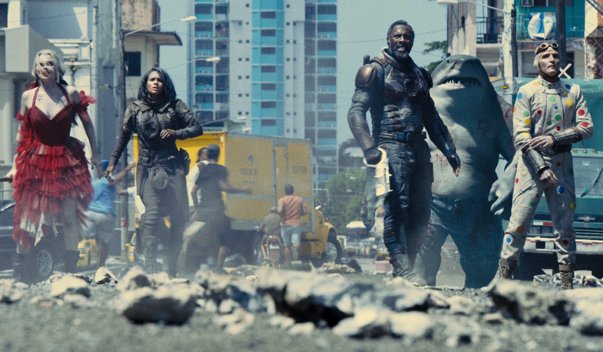 Harley Quinn, Ratcatcher-2, Bloodsport, King Shark, and Polka Dot Man in the middle of the street in The Suicide Squad.
