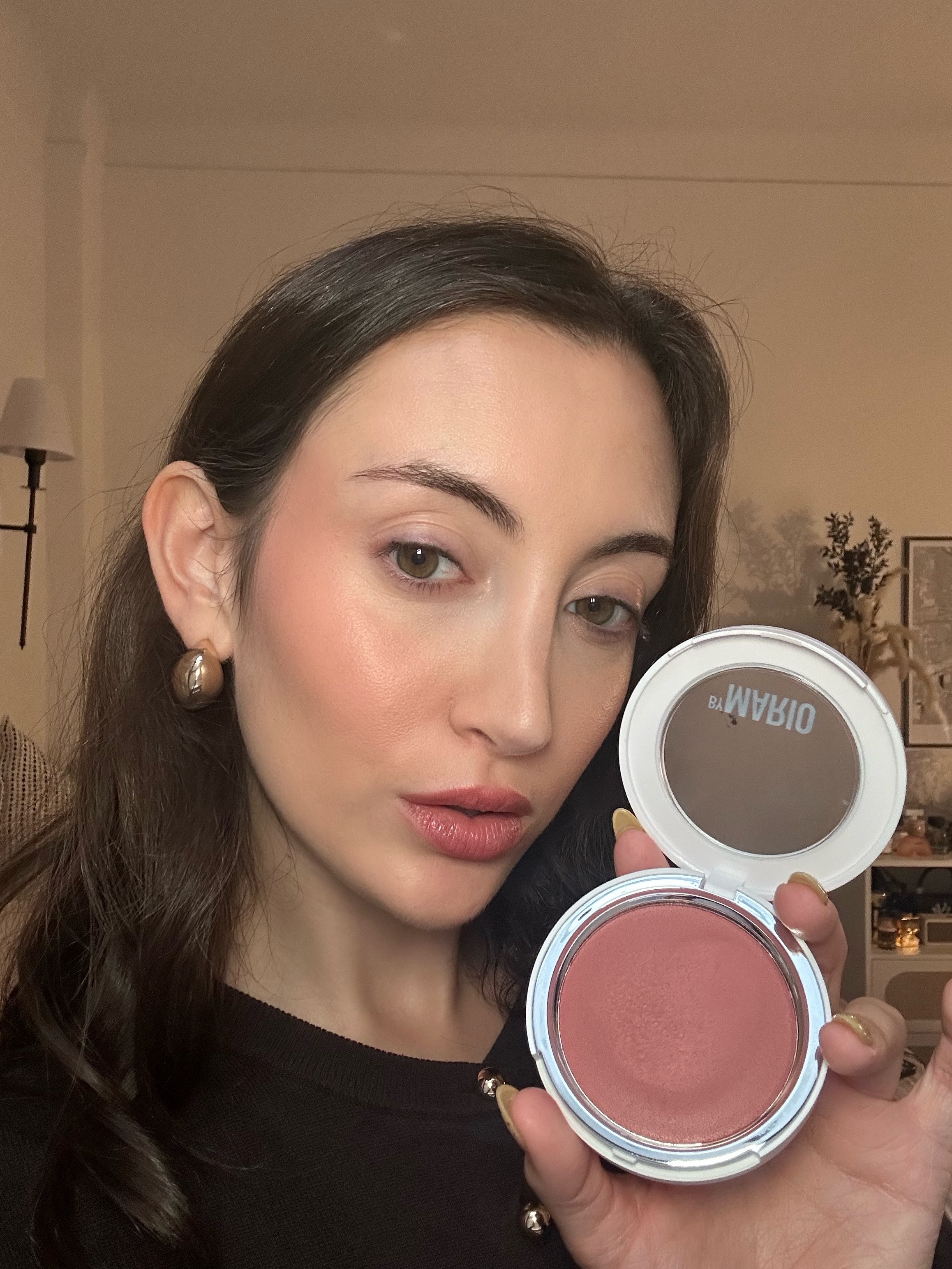 Associate beauty editor Alyssa Brascia wears the Makeup by Mario Soft Pop Cream Blush.