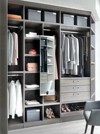 open wardrobes filled with clothes