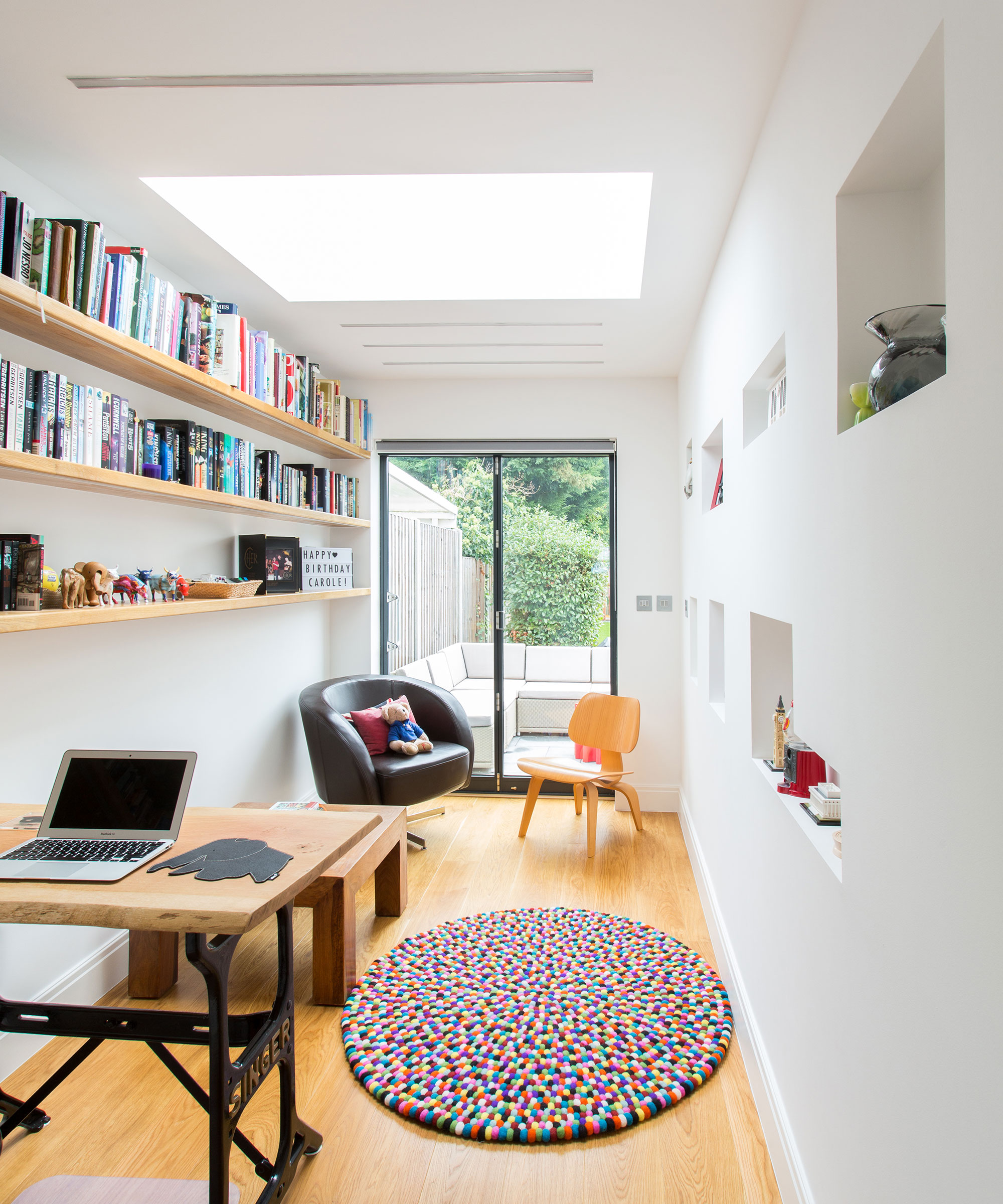 home office garage conversion with roof lantern and bifold doors