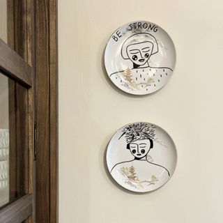 Lisa Dawson utility room with plates hanging on wall