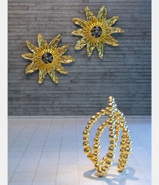 gold flower sculptures and necklace sculpture, from Jean-Michel Othoniel 'Under an Endless Light'