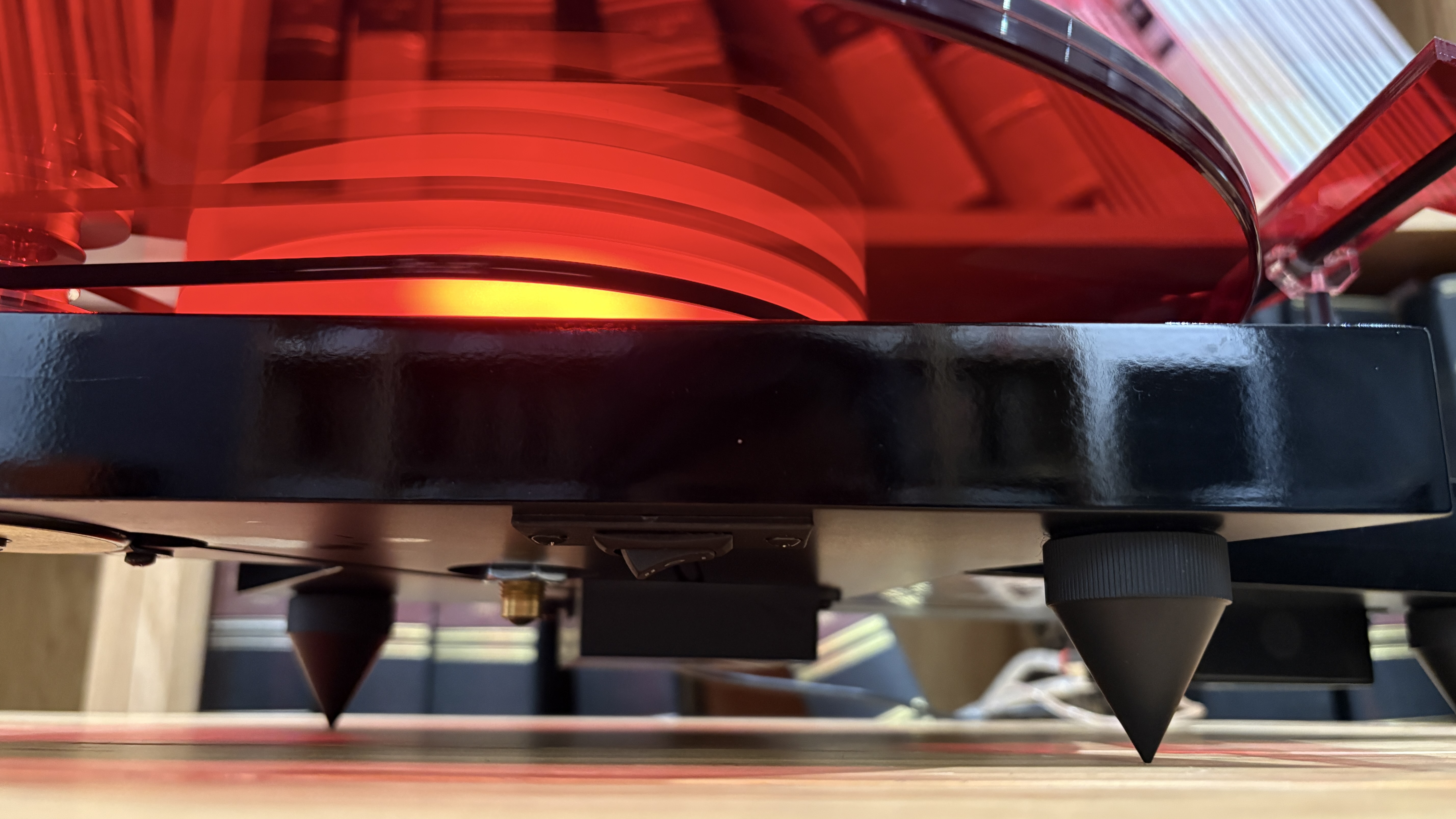 Pro-Ject AC/DC Turntable on wooden hi-fi rack