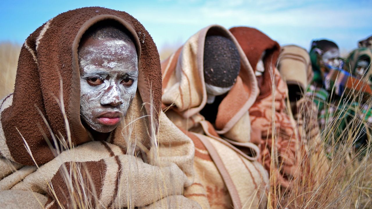 Boys from the Xhosa tribe who have undergone a circumcision ceremony sit near Qunu on June 30, 2013. 