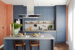 blue compact modern kitchen with small kitchen island