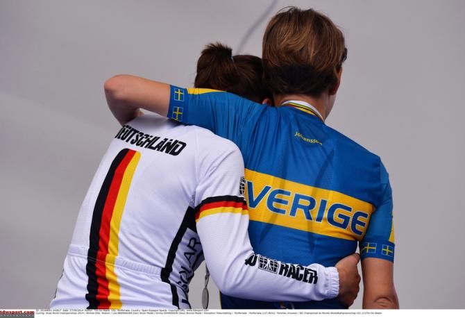 Lisa Brennauer (Germany) and Emma Johansson (Sweden) embrace after the podium