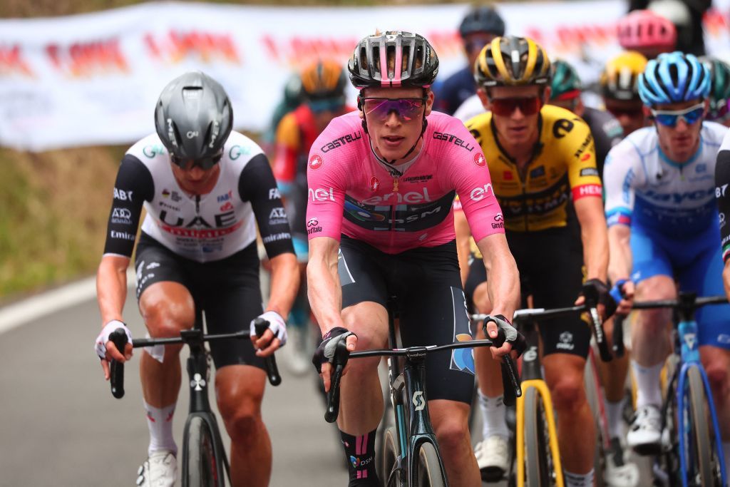 Team DSMs Norwegian rider Andreas Leknessund C wearing the overall leaders pink jersey cycles during the eighth stage of the Giro dItalia 2023 cycling race 207 km between Terni and Fossombrone on May 13 2023 Photo by Luca Bettini AFP Photo by LUCA BETTINIAFP via Getty Images