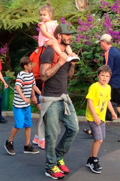 David Beckham carried Harper on his shoulders at Legoland