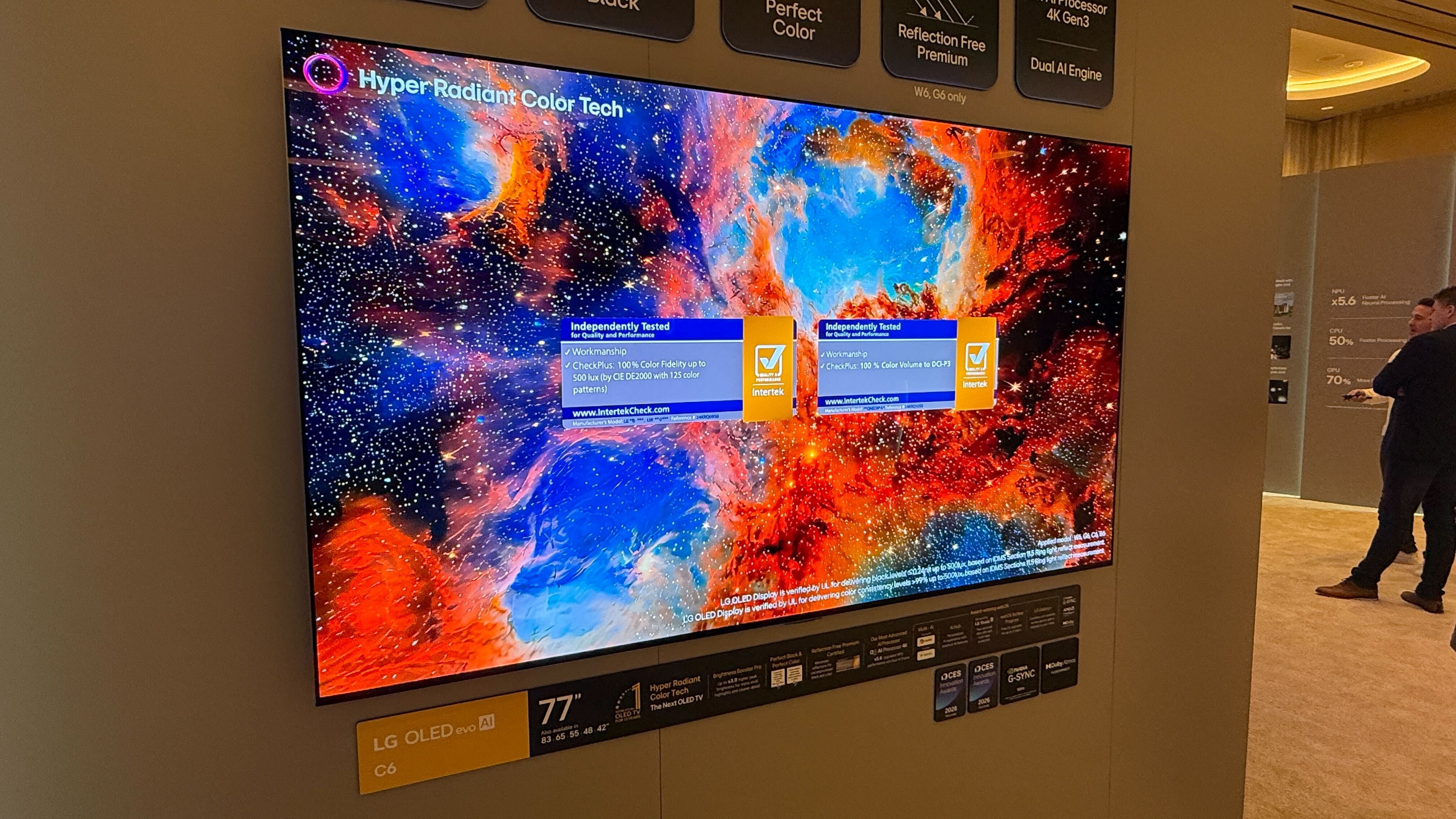 A wall mounted LG C6 OLED TV at LG's CES 2026 booth