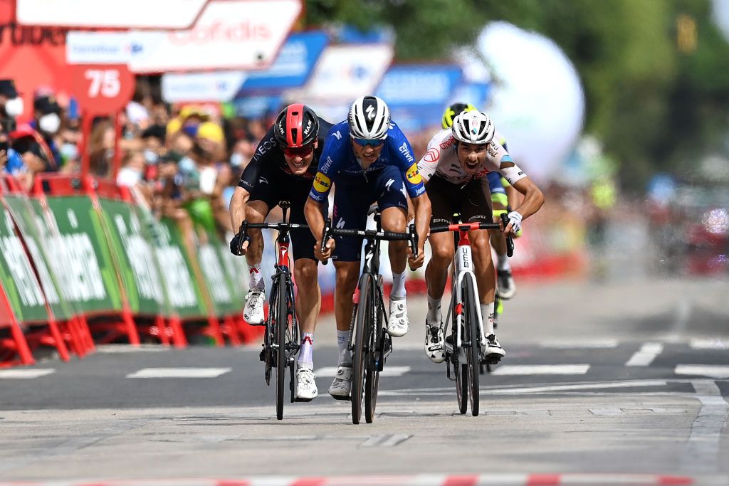 RINCON DE LA VICTORIA SPAIN AUGUST 24 LR Dylan Van Baarle of Netherlands and Team INEOS Grenadiers Mauri Vansevenant of Belgium and Team Deceuninck QuickStep and Clment Champoussin of France and AG2R Citren Team sprint at finish line during the 76th Tour of Spain 2021 Stage 10 a 189km stage from Roquetas de Mar to Rincn de la Victoria lavuelta LaVuelta21 on August 24 2021 in Rincon De La Victoria Spain Photo by Stuart FranklinGetty Images