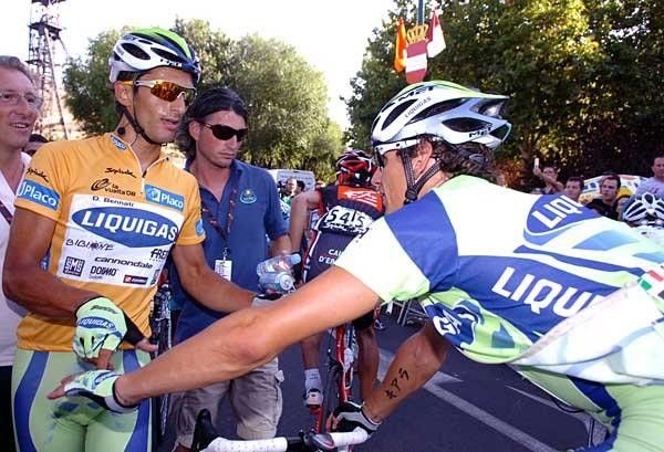 Daniele Bennati greets a team-mate after the finish line.