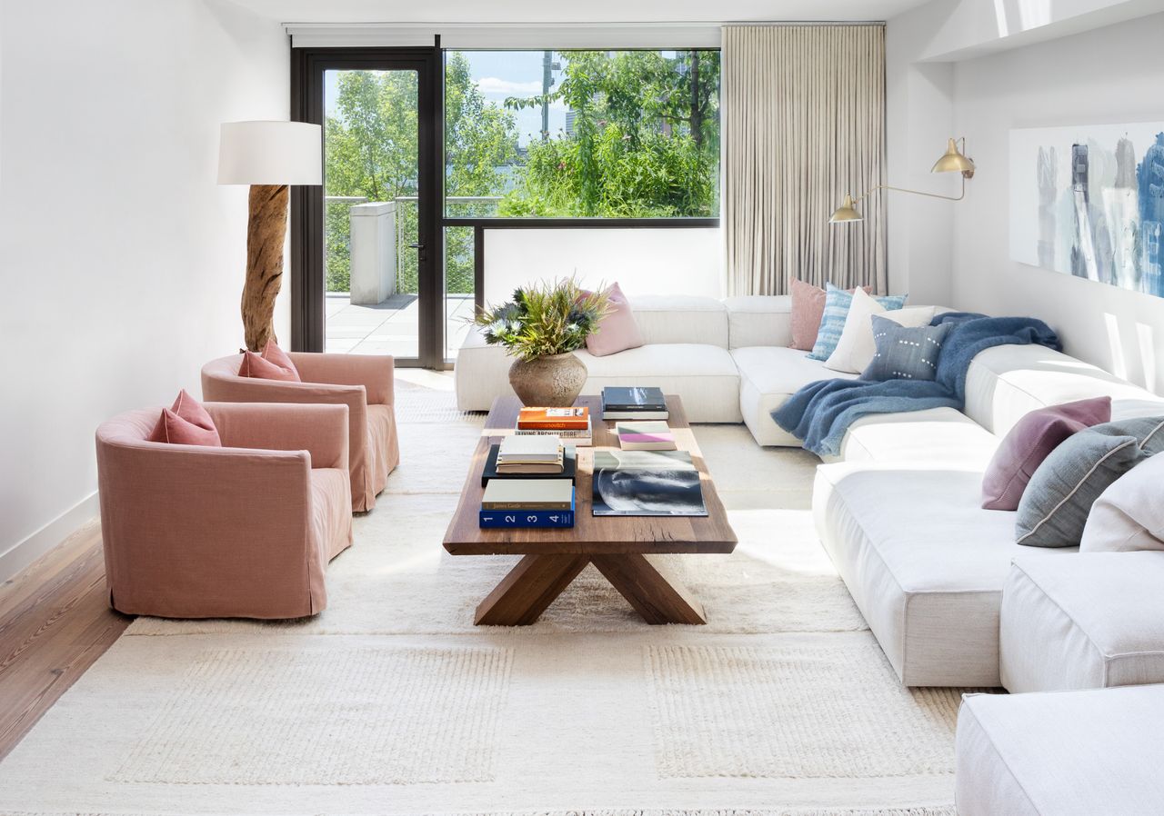 A living room with multicolored throw pillows