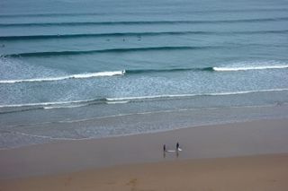 Image of the sea and sand outside watergate bay