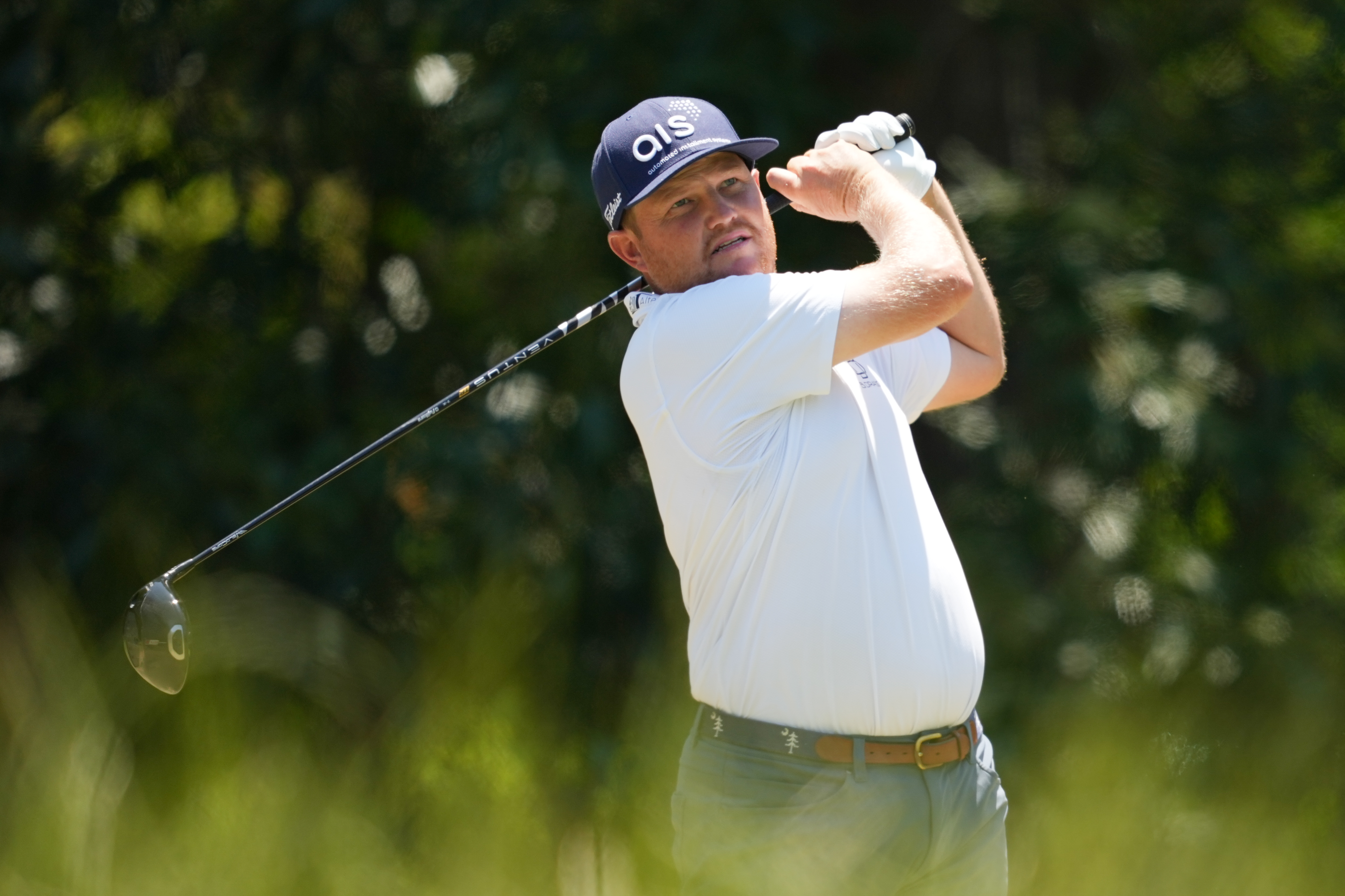 Zac Blair plays his shot from the seventh tee during the third round of the Colonial Life Charity Classic