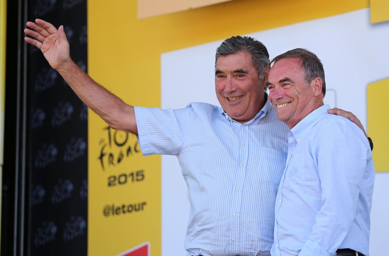 Eddy Merckx and Bernard Hinault on the podium