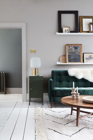 A living room wall decorated in French Grey emulsion from Little Greene