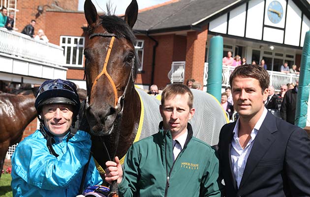 Kieren Fallon, owner-breeder Michael Owen and groom Christopher Ely with Brown Panther after winning the totepool Pontefract Castle Stakes Pontefract 24/6/2012 photo:Alec Russell/racingfotos.com THIS IMAGE IS SOURCED FROM AND MUST BE BYLINED