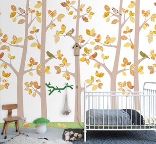 Nubie Into the Woods wallpaper with white cot