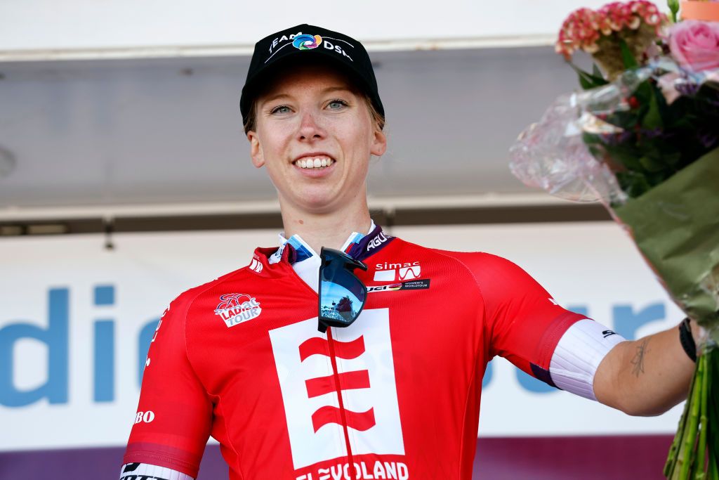 LELYSTAD NETHERLANDS AUGUST 30 Lorena Wiebes of Netherlands and Team DSM celebrates winning the stage on the podium ceremony after the 25th Simac Ladies Tour 2022 Stage 1 a 1412km stage from Lelystad to Lelystad SLT2022 UCIWWT on August 30 2022 in Lelystad Netherlands Photo by Bas CzerwinskiGetty Images