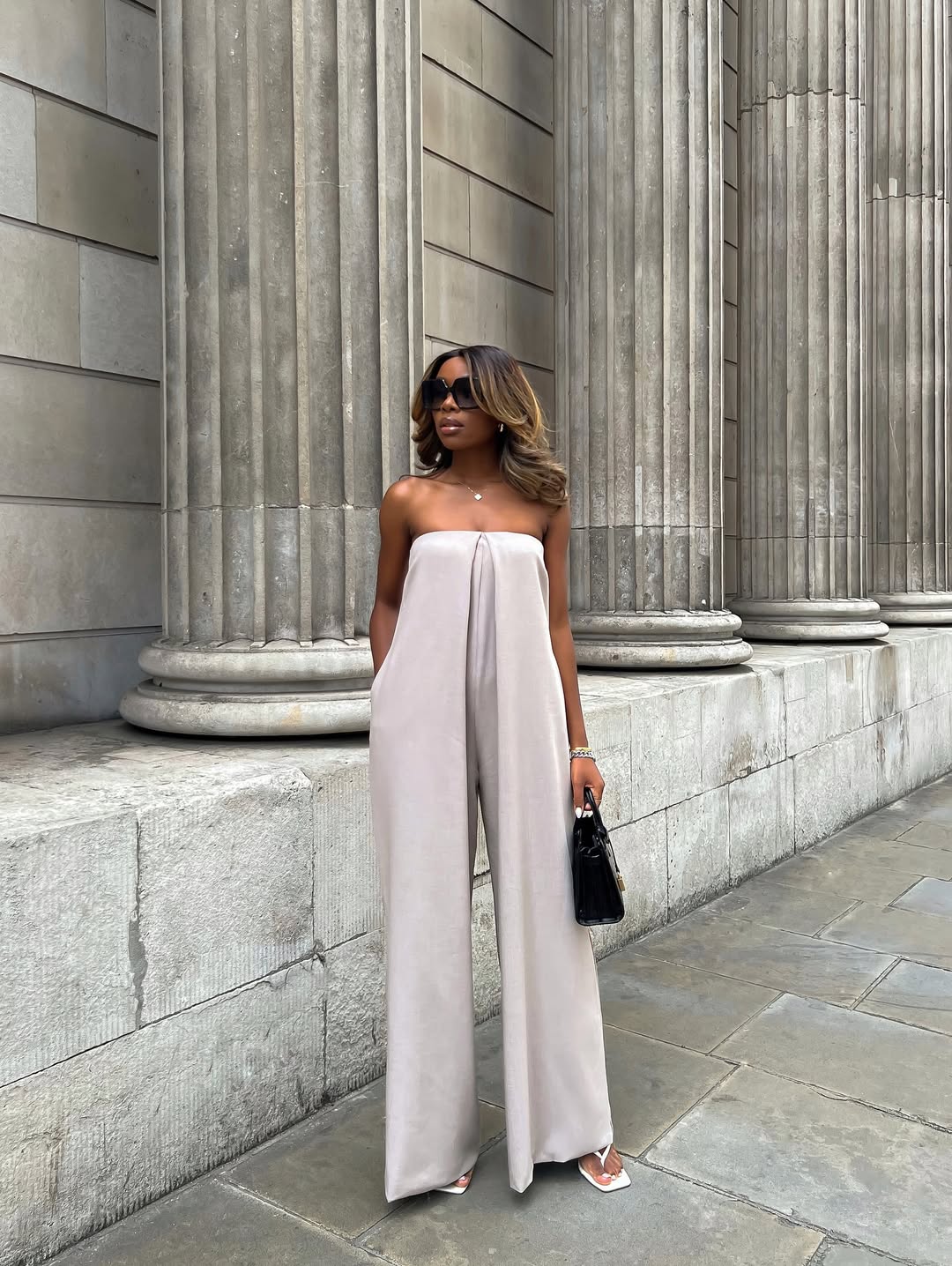 Alexandriah in a strapless jumpsuit