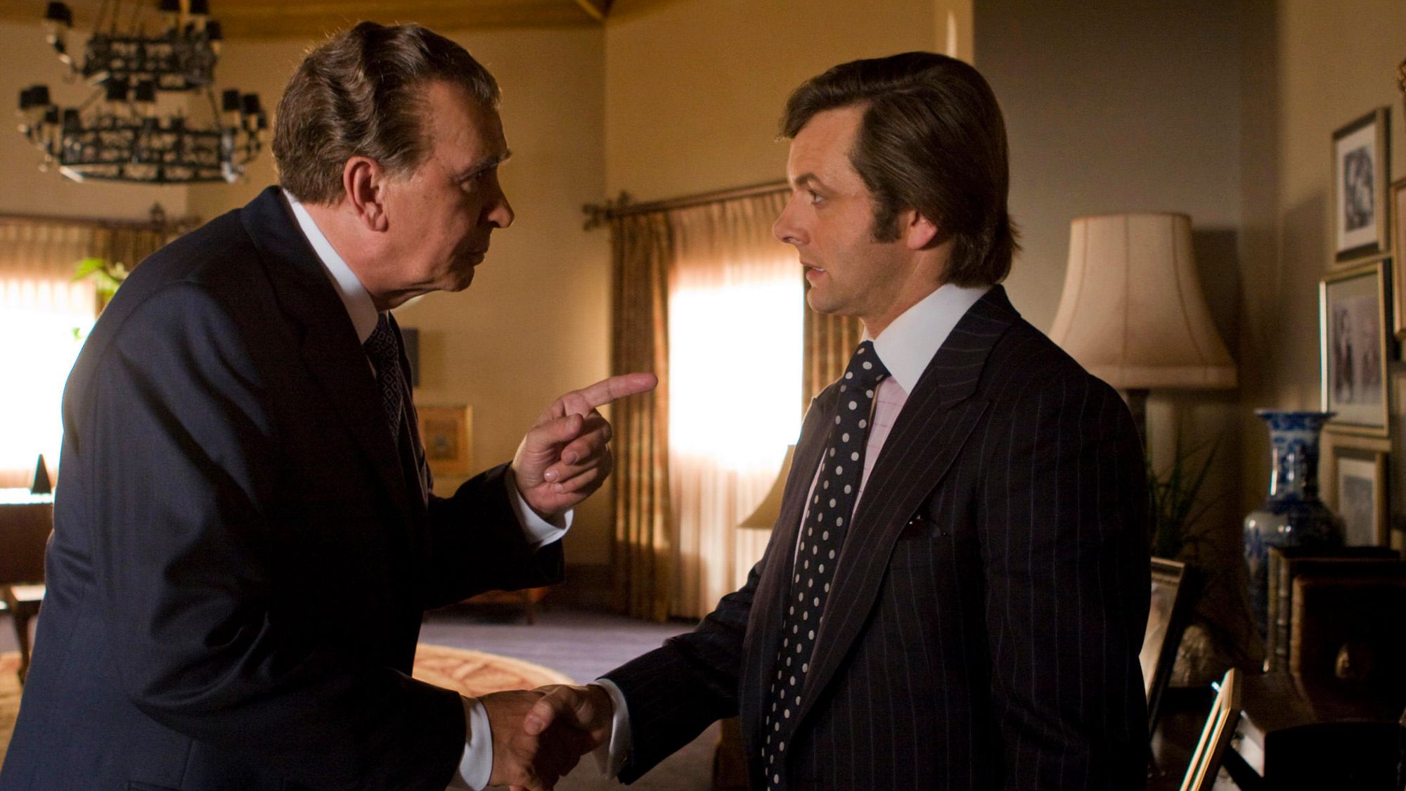 FRANK LANGELA as Richard Nixon and MICHAEL SHEEN as David Frost in Frost/Nixon