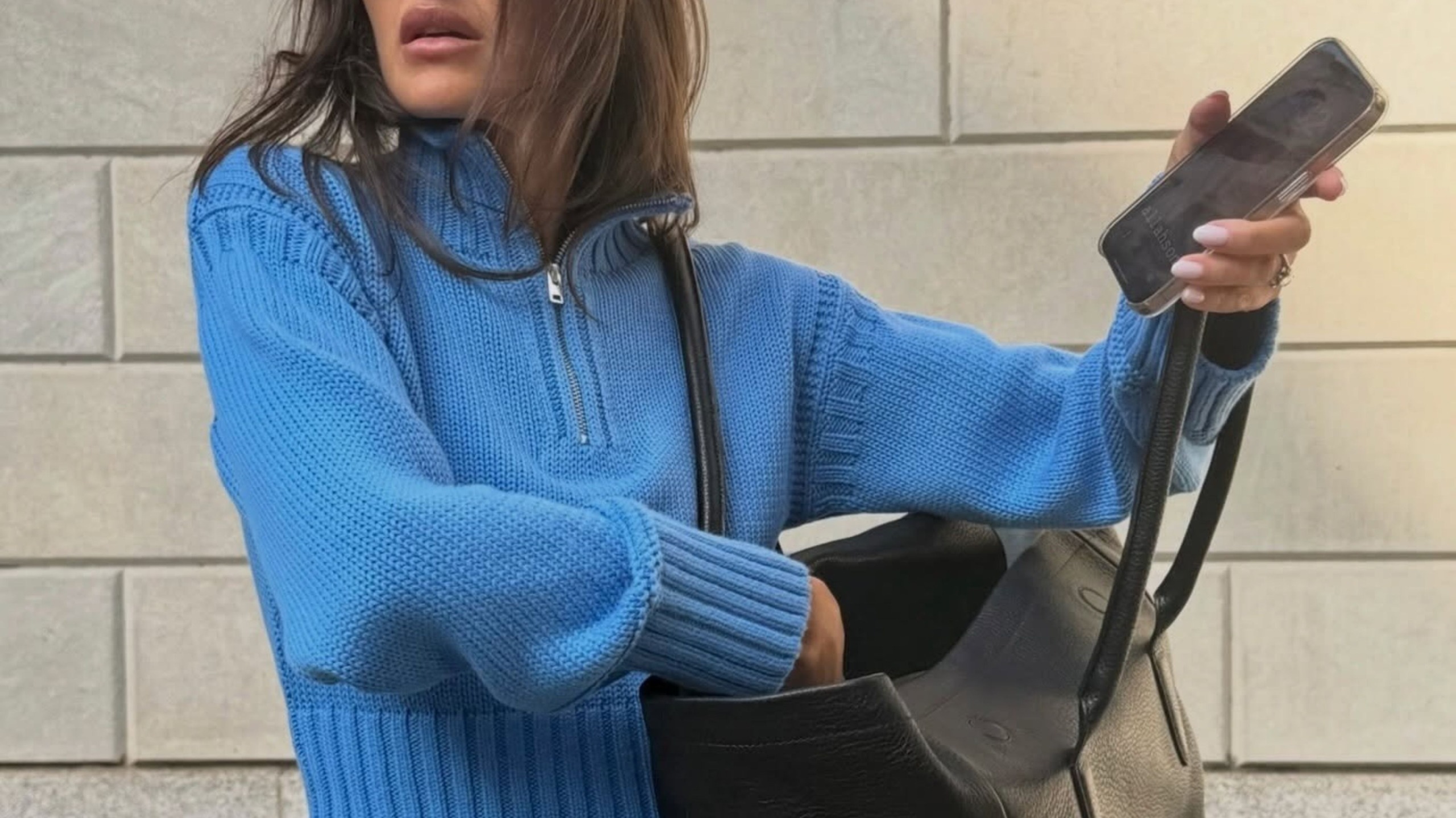 @molliewolffstyle wearing a J.Crew Tiny Rollneck.