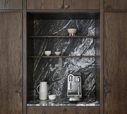 marble coffee niche in a modern wood kitchen cabinets