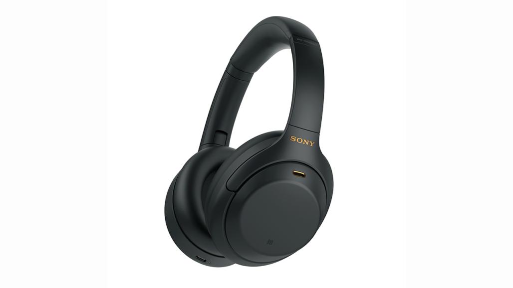 Headphone peredam bising Sony wh-1000xm4 berwarna hitam dengan latar belakang putih.