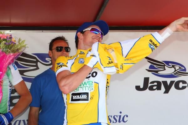 Chris Sutton pulls on the final leader's jersey after he sealed the overall title