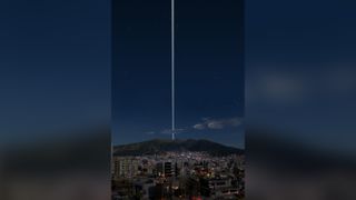 What the sky might look like if Earth had rings like Saturn, from the perspective of Quito, Ecuador.