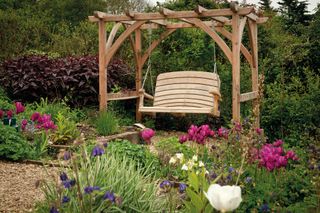 Cottage backyard ideas - swing seat
