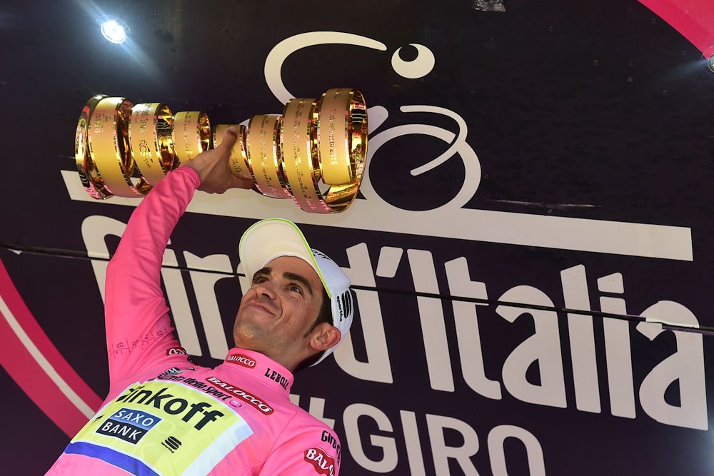 Alberto Contador holds his trophy aloft after the final stage of the 2015 Giro d'Italia.