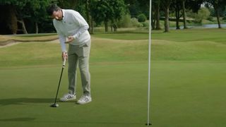 Photo of Joe Ferguson testing the LAB Golf DF3 putter