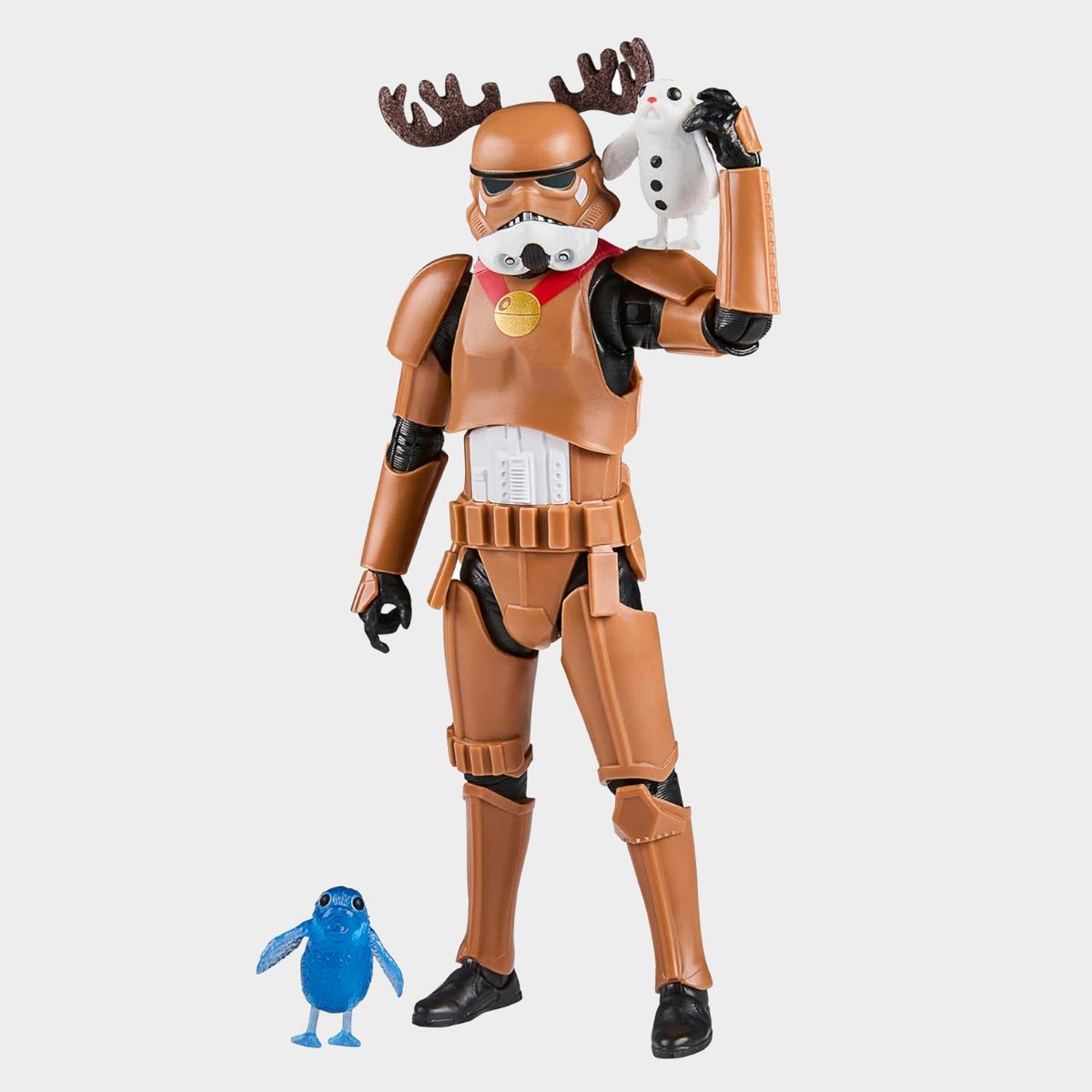 Star Wars The Black Series Stormtrooper (Holiday Edition) carrying Christmas-themed porgs against a plain background