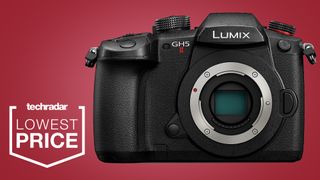 The Panasonic GH5 Mark II camera on a red background