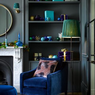 living room with blue velvet armchair