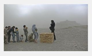 A still from the 'Brick Sellers of Kabul' film, by Lida Abdul, 2006.