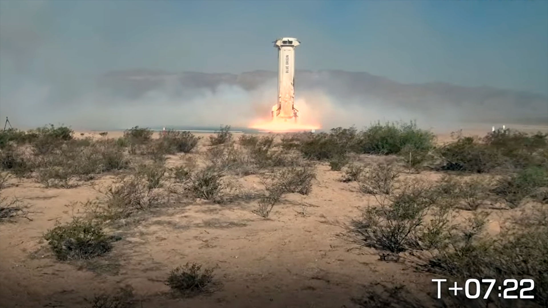 a rocket booster lands vertically after lofting a crewed capsule on a suborbital spaceflight