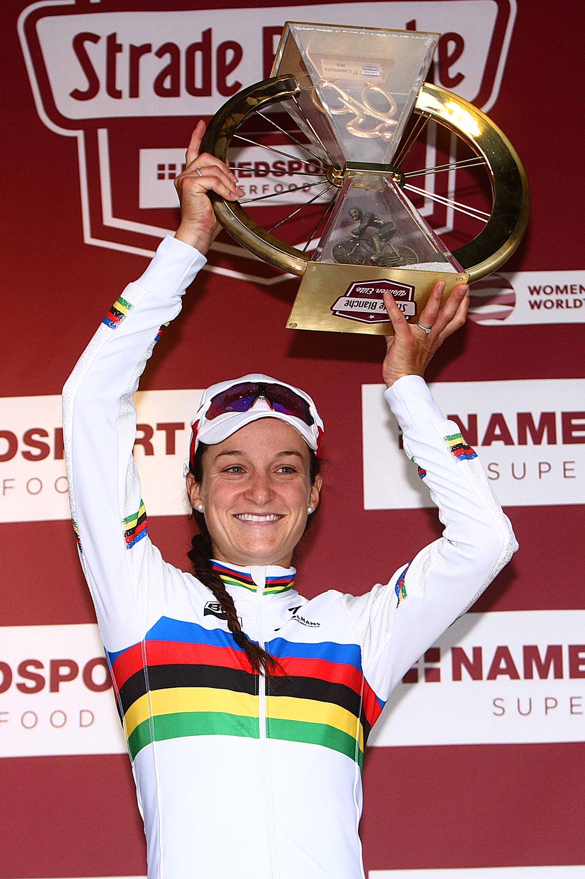 Lizzie Armitstead celebrates her Strade Bianche win