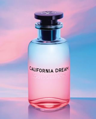 Bottle of California Dream perfume against a bright purple and pink background