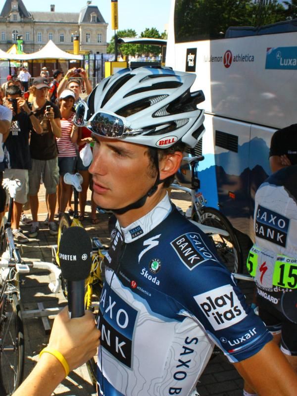 Andy Schleck meets the media outside the team bus