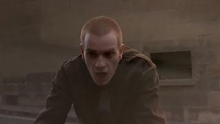 Ewan McGregor looking stunned and almost being hit by a car in Trainspotting