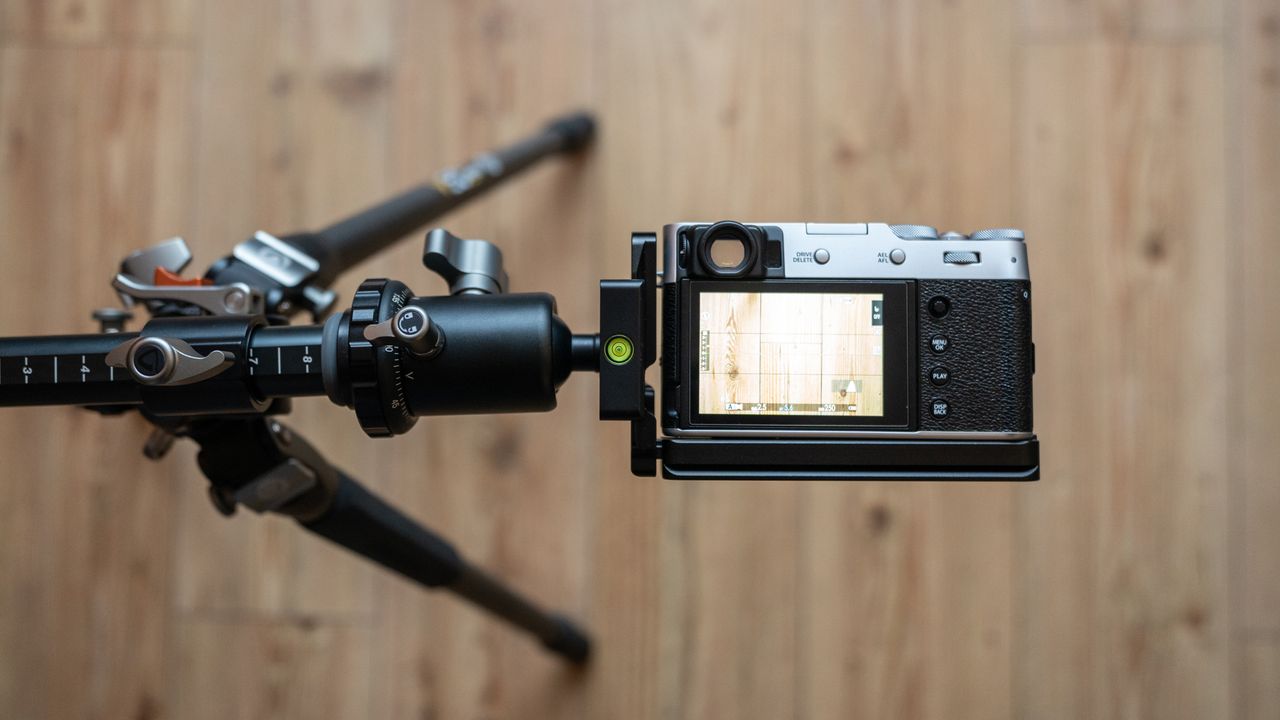 A camera photographing a flat lay scene