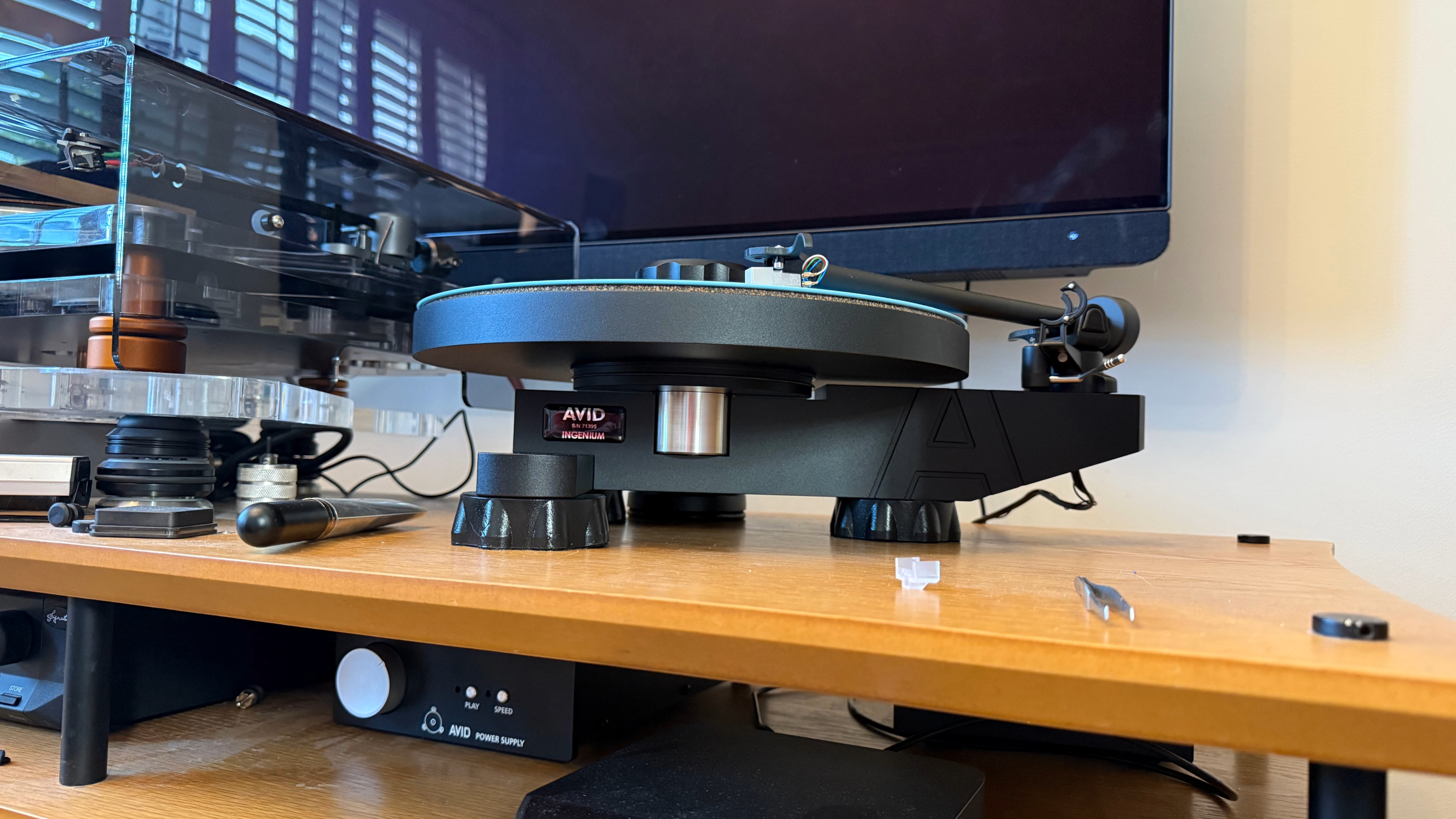 Avid Ingenium Plug&Play turntable on a wooden stand