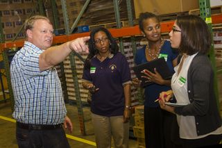 Researchers visit a food bank