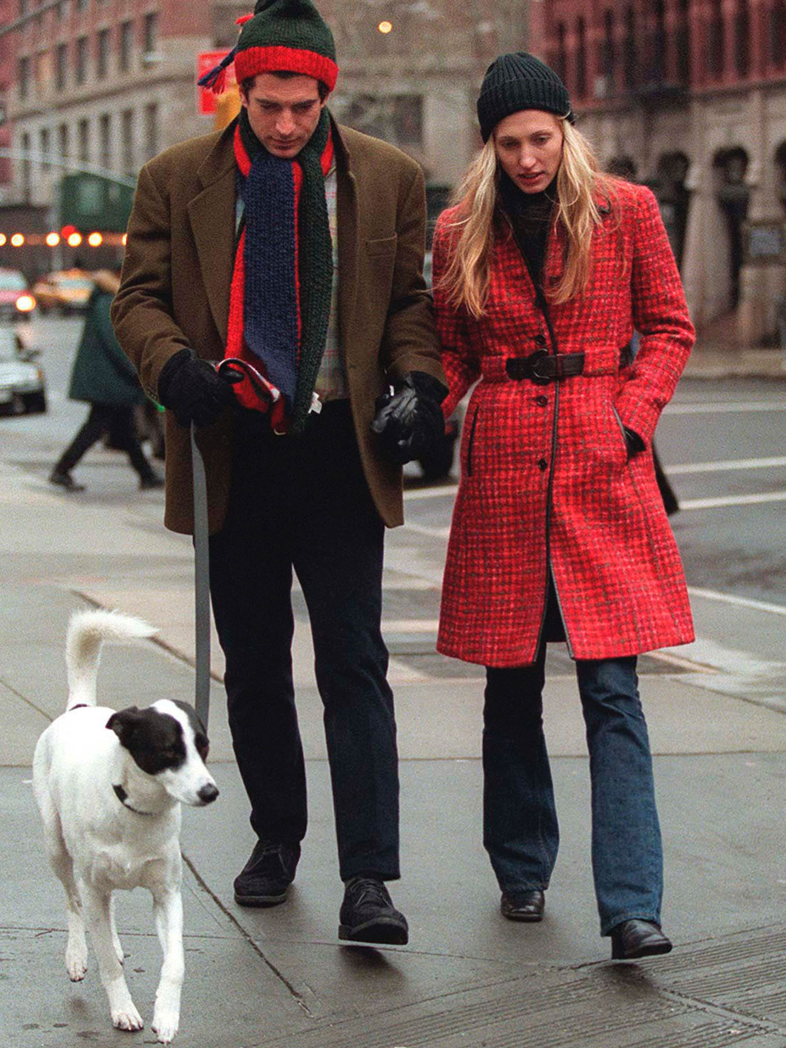 Carolyn Bessette Kennedy wears a red coat winter outfit